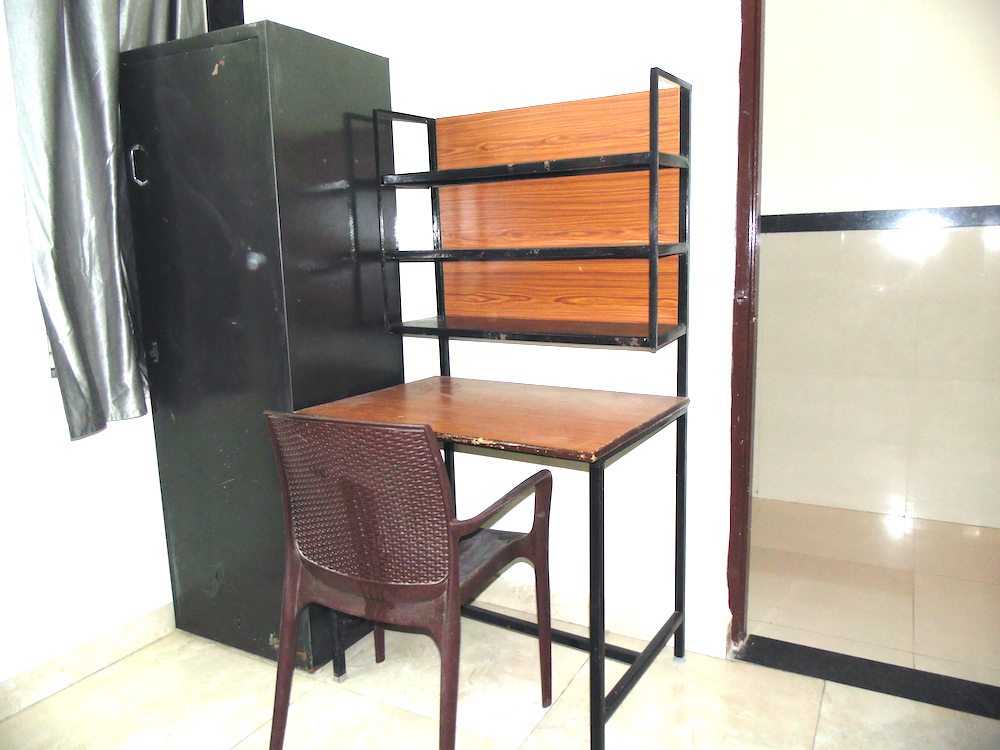 study table and chair facility in hostel room